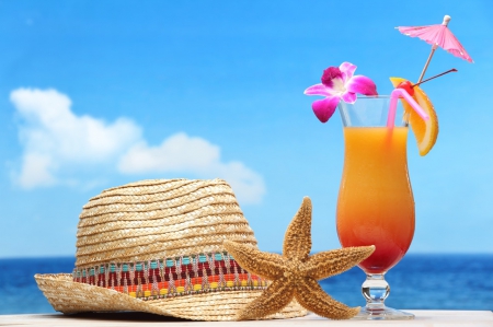 image of summer hat and cocktail